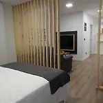Galerias 16 Viviendas Turisticas דירה לוגו